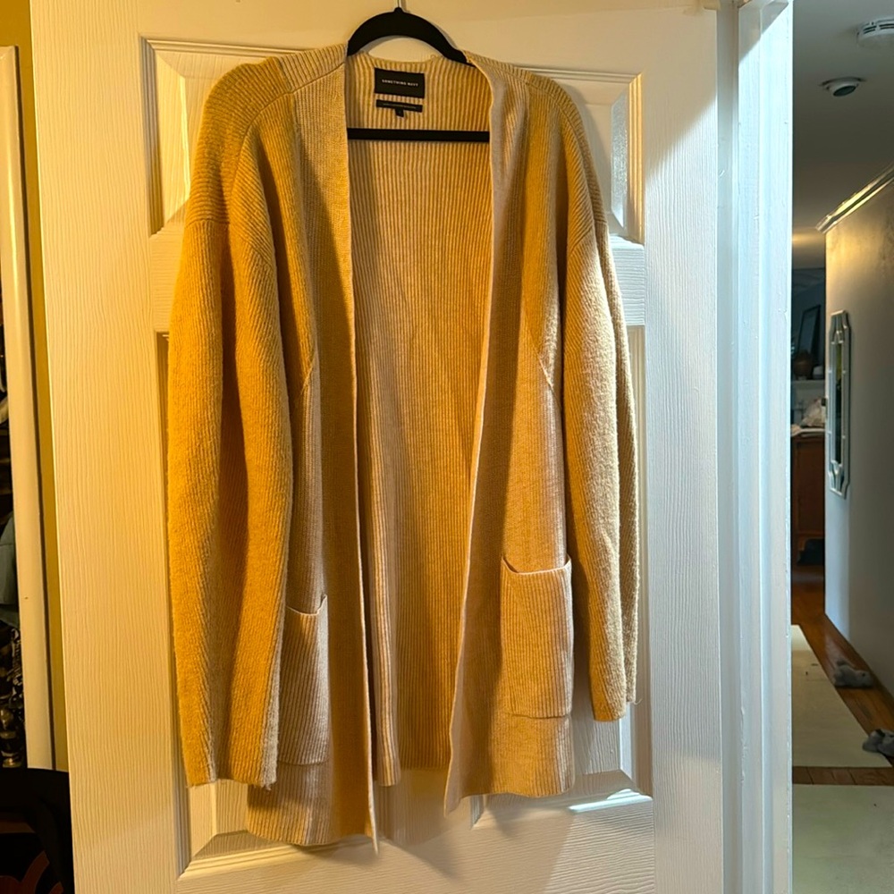 Size S something Navy 2 tone sweater cardigan, soft lightly used. Super cute.